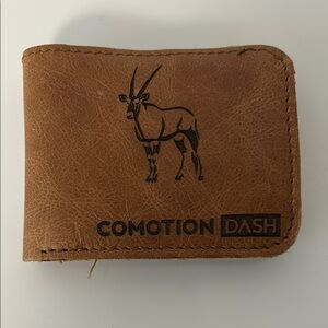 Brown Leather Bifold Wallet with Antelope Logo Rugged Safari-Inspired Style
New